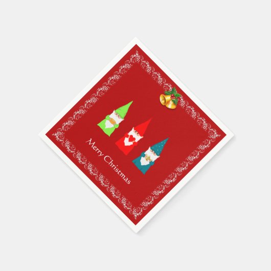 Drie kerstgnomen op rood servet (Hoek)