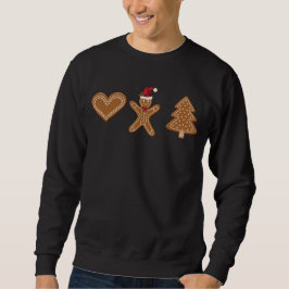 Drie kerstkoekvormen van gemberkoek trui
