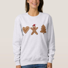 Drie kerstkoekvormen van gemberkoek trui