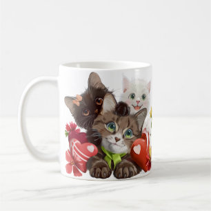 Drie kittens en harten koffiemok
