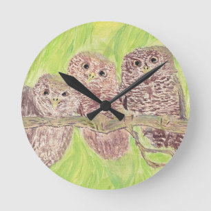 Drie kleine cowling-eigenaars - acrylschilderij. ronde klok