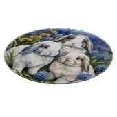 Drie kleine luskonijntjes snijplank (Hoek)