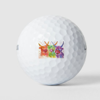 Drie kleurrijke Koeien Golfballen