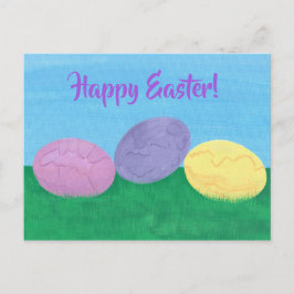 Drie kleurrijke paaseieren in het groene gras Brie Feestdagenkaart