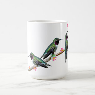 Drie kolibries neergestreken op een tak van een fl koffiemok