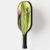 Drie komkommers op Gele Pickleball Paddles (Links)