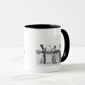 Drie mannen lassoing. mok (Voorkant rechts)