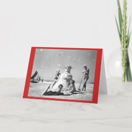 Drie meisjes die een Snowman maken op de Beach kaa Feestdagen Kaart