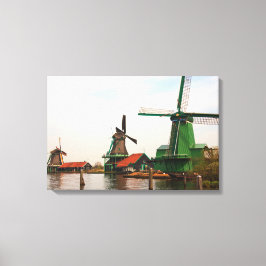 Drie Nederlandse windmolens weerspiegeld in water Canvas Afdruk