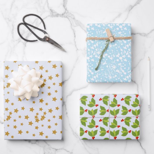 Drie oppervlaktekatronen sterren sneeuwholbessen inpakpapier vel (Voorkant)