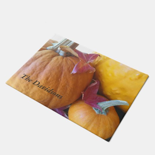 Drie pompoenen met bladeren deurmat (Schuin)