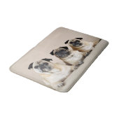 Drie pugs in rij badmat (Gekanteld)
