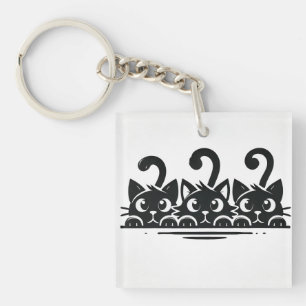 Drie schattige cartoon katten met grote ogen sleutelhanger