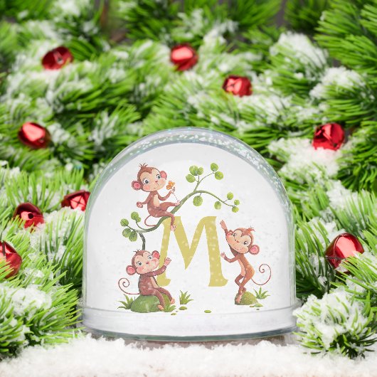 Drie Schattigee geluksapen en een monogram Sneeuwbol (Kerstmis)