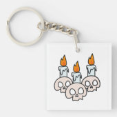 Drie schedels met brandende kaarsen sleutelhanger (voorkant)