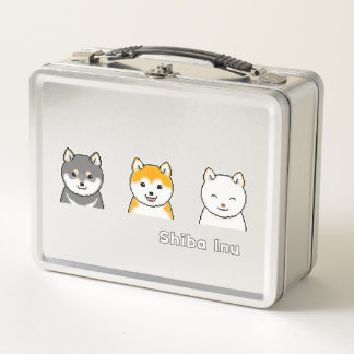 Drie shiba-infuushonden met verschillende kleuren 