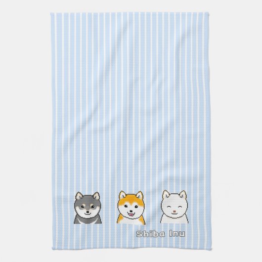 Drie shiba-infuushonden met verschillende kleuren  theedoek (Verticaal)