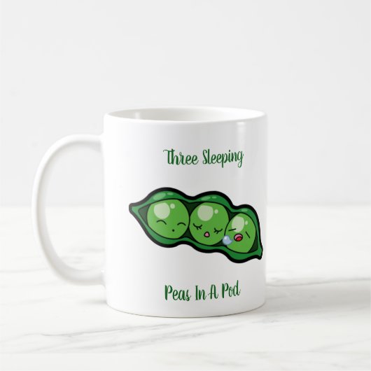 Drie slapende erwten in een peul koffiemok (Links)