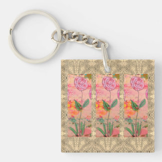 Drie spiraalvormige bloemen sleutelhanger