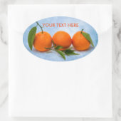 Drie Tangerines Ovale Sticker (Tas)