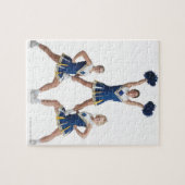 drie tienercheerleaders in het caucasiaanse vrouw legpuzzel (Horizontaal)