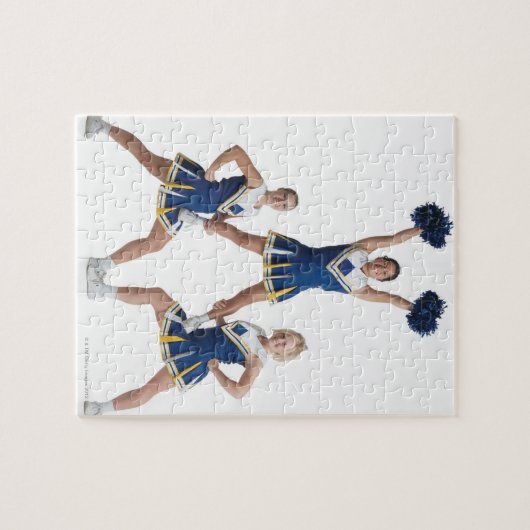 drie tienercheerleaders in het caucasiaanse vrouw legpuzzel (Horizontaal)