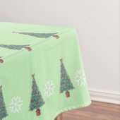 drie versieringen met rode bogen gouden bells kers tafelkleed (Voorbeeld)