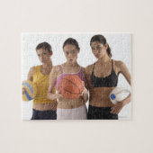 drie vrouwen van verschillende ras die in het bezi legpuzzel (Horizontaal)