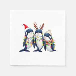 Drie walvissen dragen kerstmuts servet