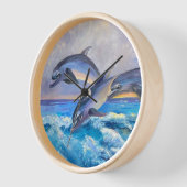 Drie wilde dolfijnen spelen in Blauwgroen water (Hoek)