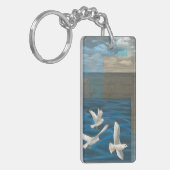Drie witte zeegarren die over het water vliegen sleutelhanger (Voorkant Links)