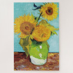 Drie zonnebloemen | Vincent Van Gogh Legpuzzel<br><div class="desc">Drie zonnebloemen (1888) van de Nederlandse kunstenaar Vincent Van Gogh. Origineel kunstschilderij is een olie op doek die een nog leven van felgele zonnebloemen tegen een turkooisachtergrond weergeeft. Gebruik de ontwerphulpmiddelen om douanetekst toe te voegen of het afbeelding te personaliseren.</div>