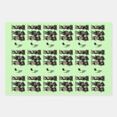 Drie zwarte kat-musici die muziek groen spelen inpakpapier vel (Voorkant)