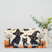 Drie zwarte katten met hoeden op Halloween (Staand voorkant)