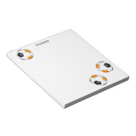 Drie zwarte oranje voetballen gepersonaliseerd notitieblok