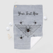 Driehoekig web met zwarte weduwe spinnen op wit golfhanddoek (Insitu)