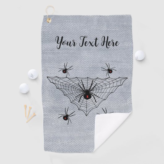 Driehoekig web met zwarte weduwe spinnen op wit golfhanddoek (Insitu)