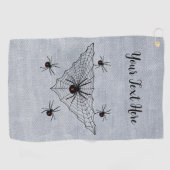 Driehoekig web met zwarte weduwe spinnen op wit golfhanddoek (Horizontaal)