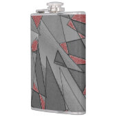 Driehoekige ruw snijdsels, op rode achtergrond heupfles (Links)