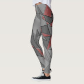 Driehoekige ruw snijdsels, op rode achtergrond leggings (Links)