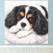 Driekleurige Cavalier King Charles Spaniel rustend Canvas Afdruk (Insitu (Houten vloer))