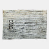 Driftwood in de schaduw van grijs strand, geperson theedoek (Horizontaal)