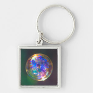 Drijvende bel reflectie sleutelhanger
