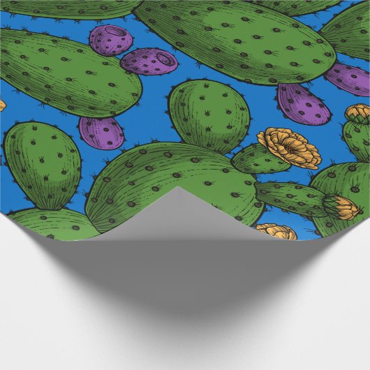 Drijvende opuntia op blauw cadeaupapier (Hoek)