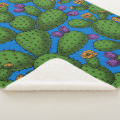 Drijvende opuntia op blauw sherpa deken (3/4)