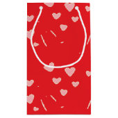 Drijvende roze harten op rood klein cadeauzakje (Achterkant)
