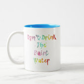 Drink het verfwater niet tweekleurige koffiemok (Links)