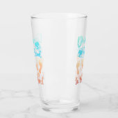 Drink in handspeelgoed in het zand - strand Gezegd Glas (Links)