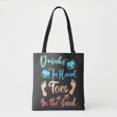 Drink in handspeelgoed in het zand - strand Gezegd Tote Bag (Voorkant)