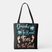 Drink in handspeelgoed in het zand - strand Gezegd Tote Bag (Achterkant)
